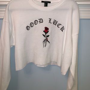 White good-luck embroidered top